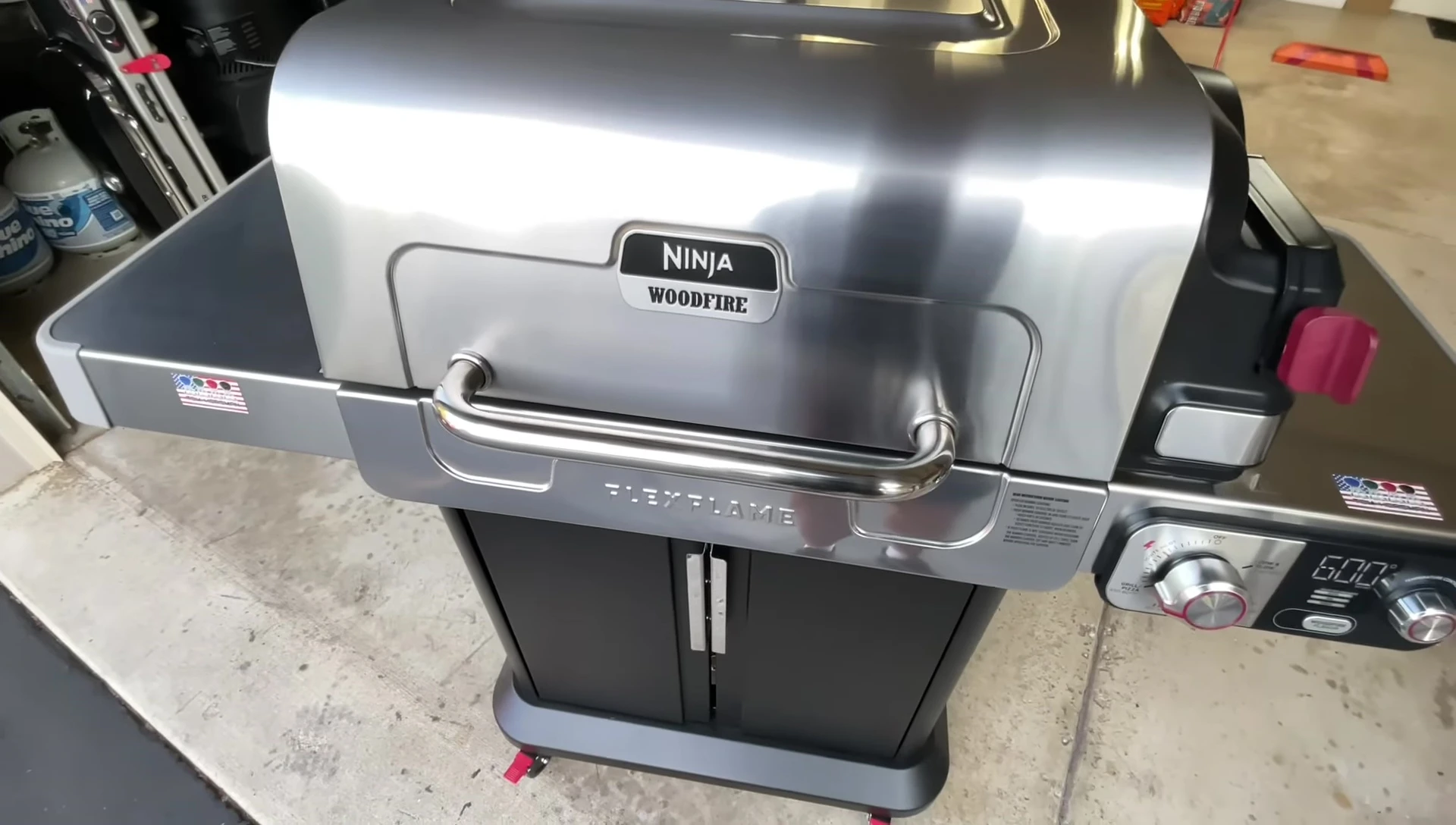 View of the grill's burners and internal components.