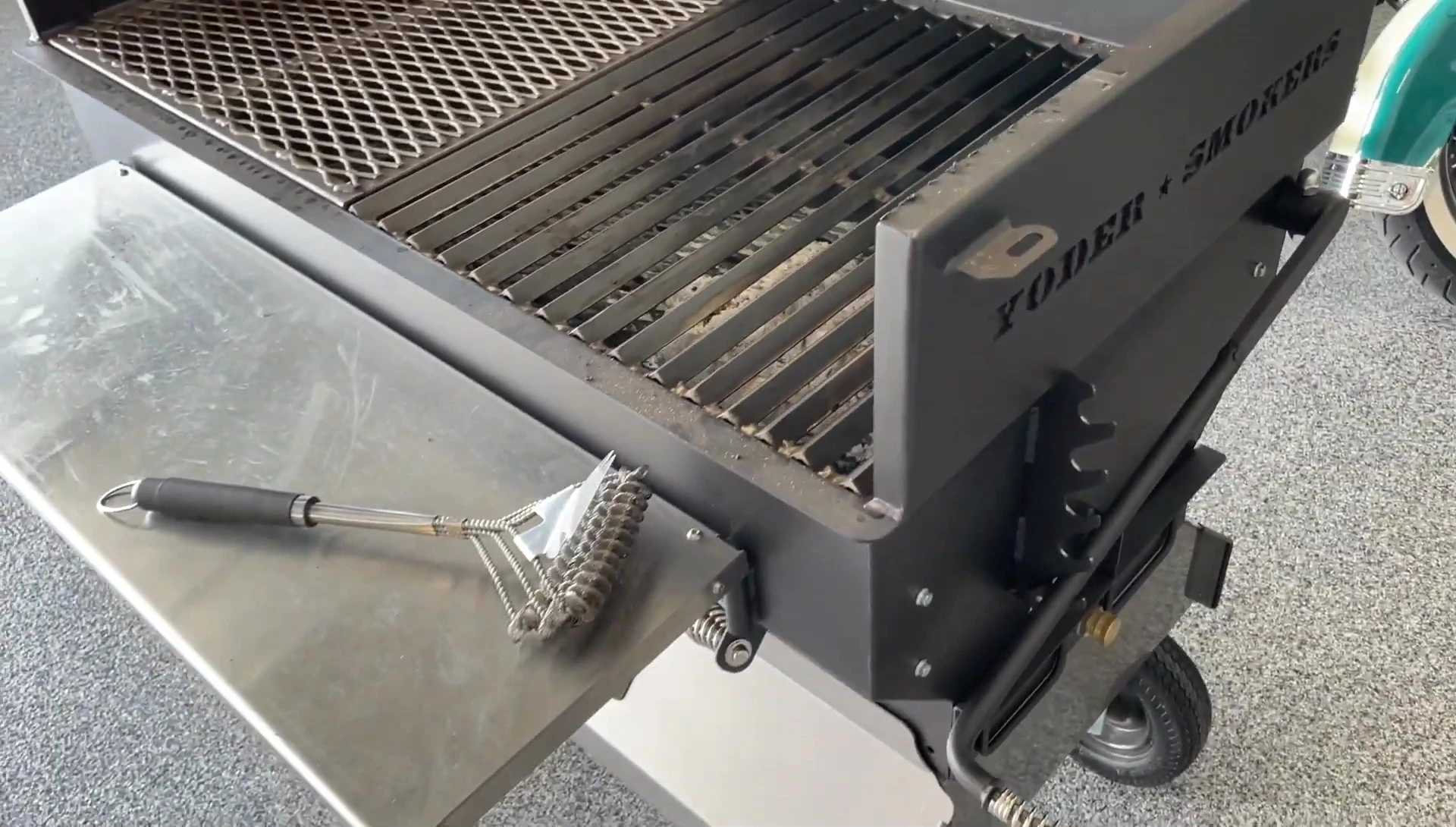 A shot emphasizing the weight and build of the grill.
