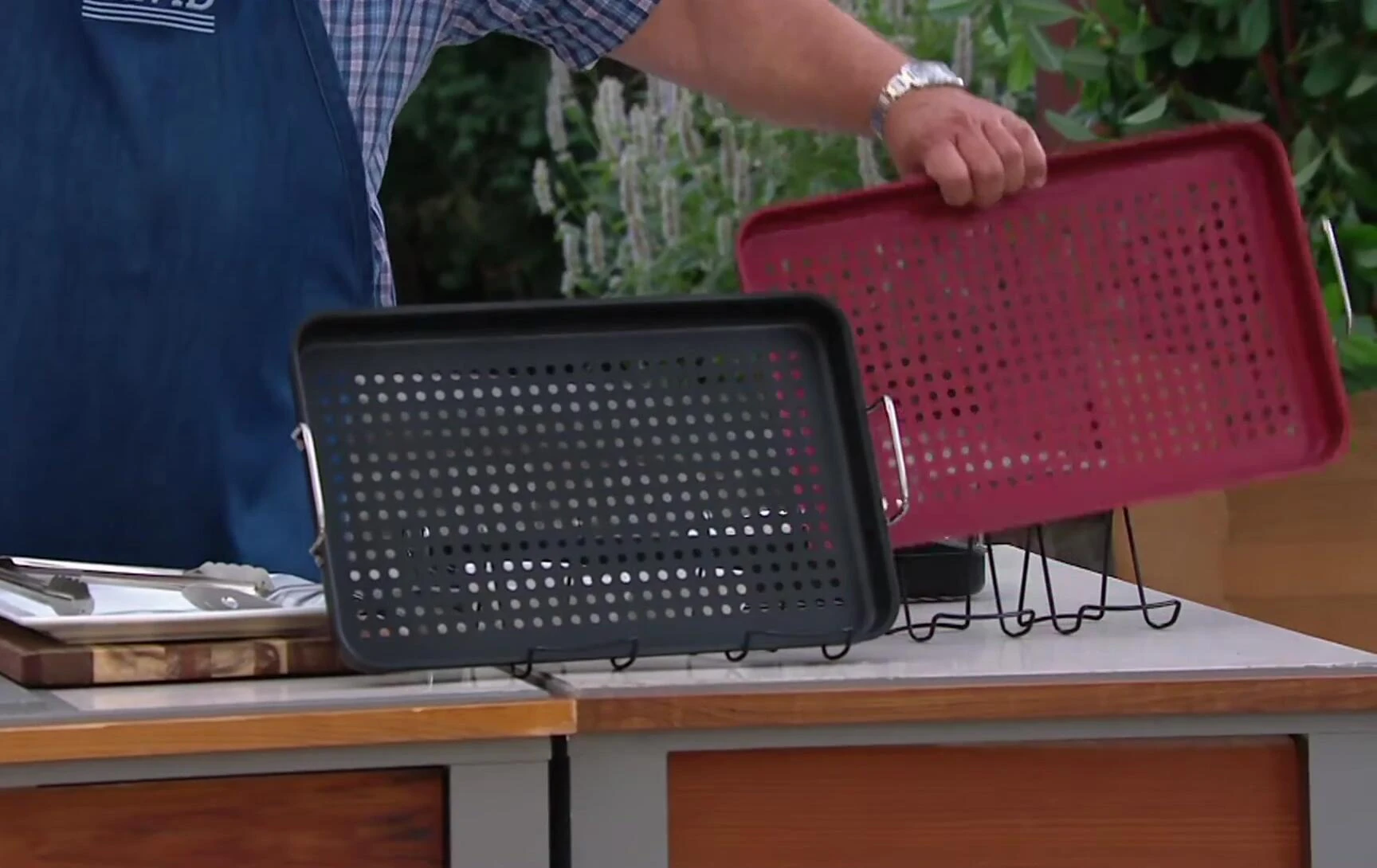 The Grillville Grill Topper showcasing its perforated design.