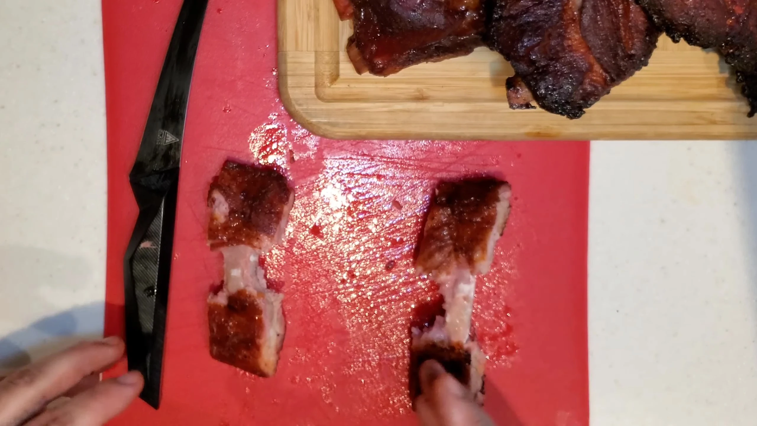 Fiancee tasting the ribs