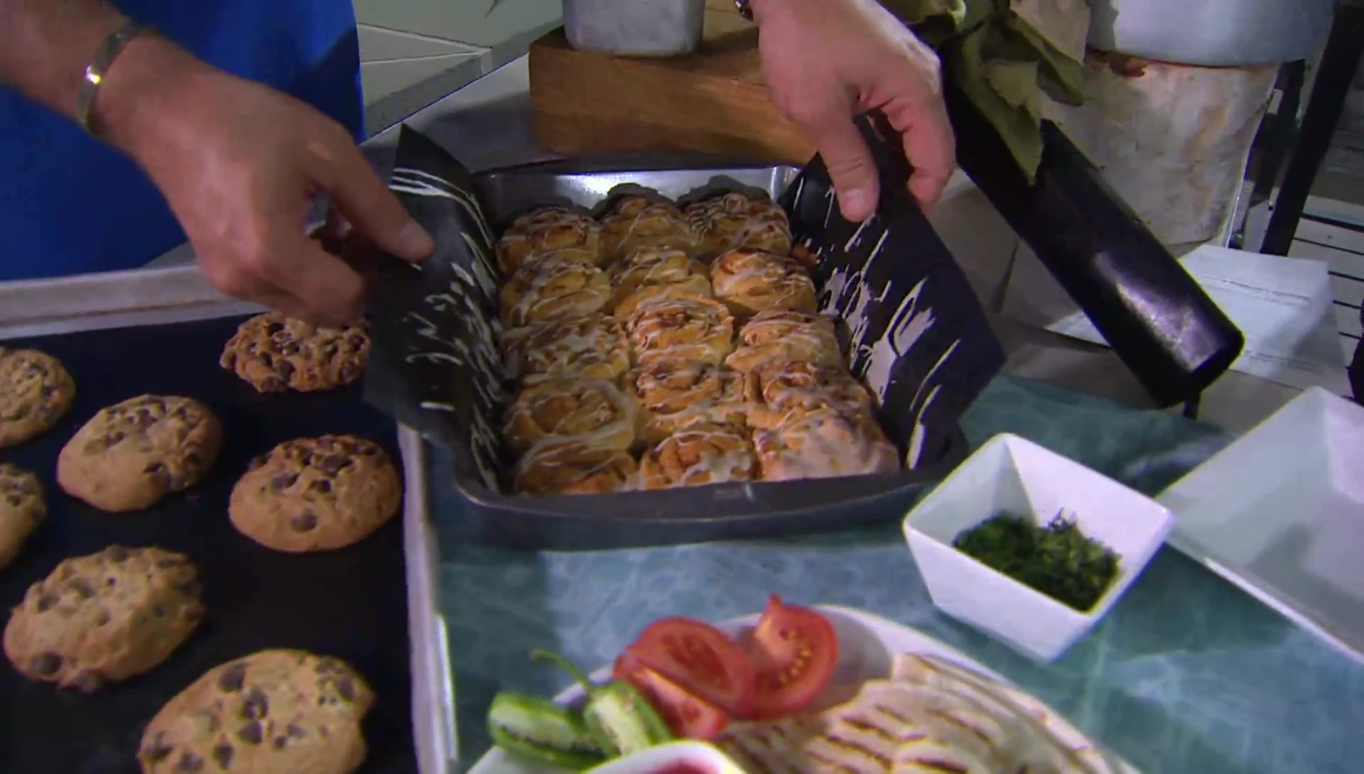 Cinnamon rolls baked on the grill mat, demonstrating its baking capabilities.