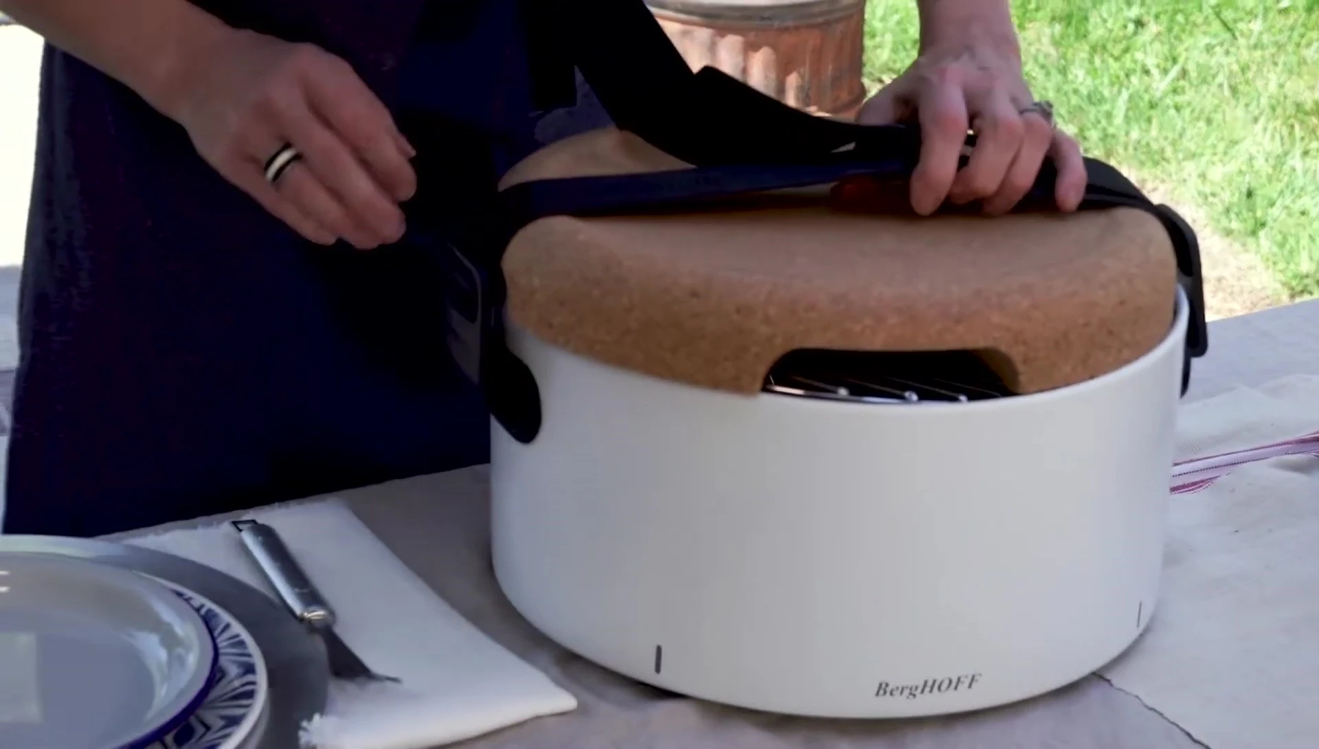 Close-up of the BergHOFF tabletop grill in its carrying case.