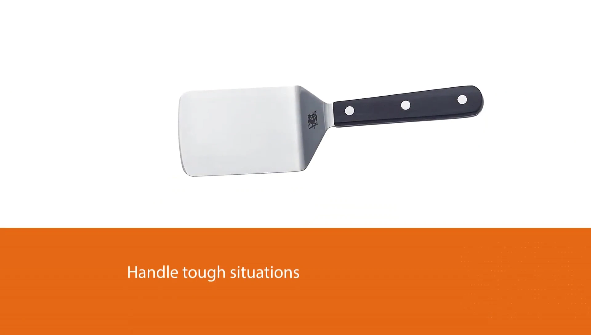 Focus on the handle and blade of the Sabatier spatula