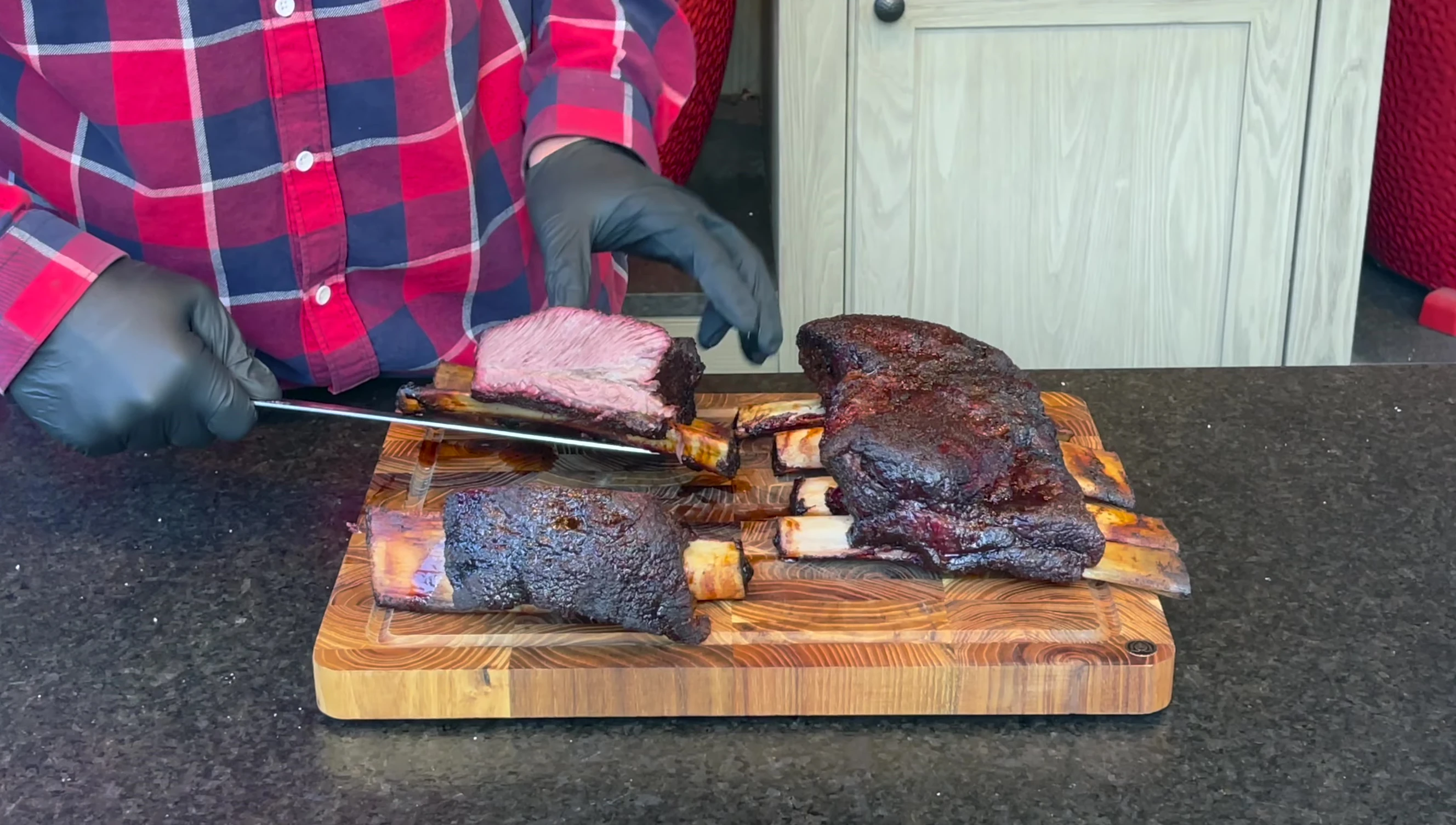 Comparing the cooked beef ribs from both grills