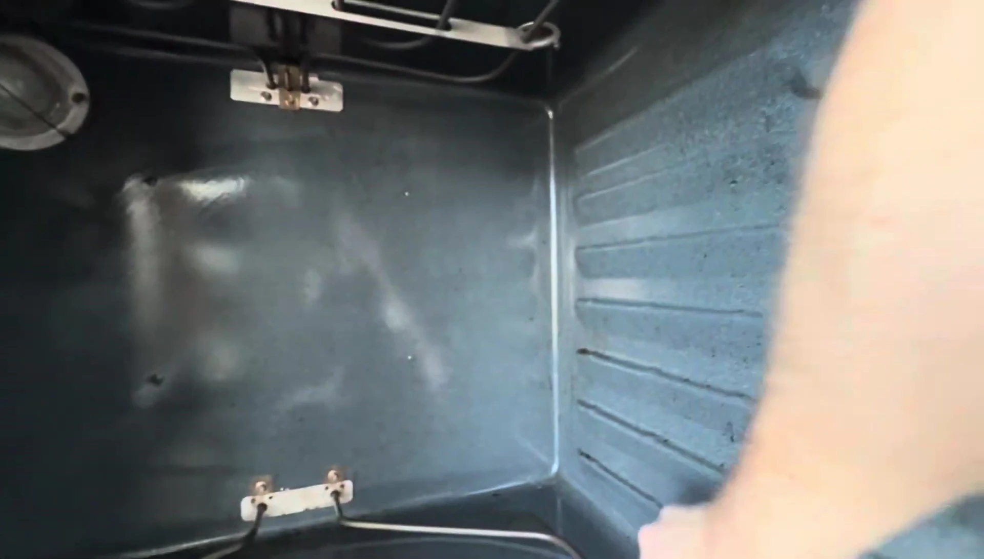 Instruction on removing the oven's heating element.