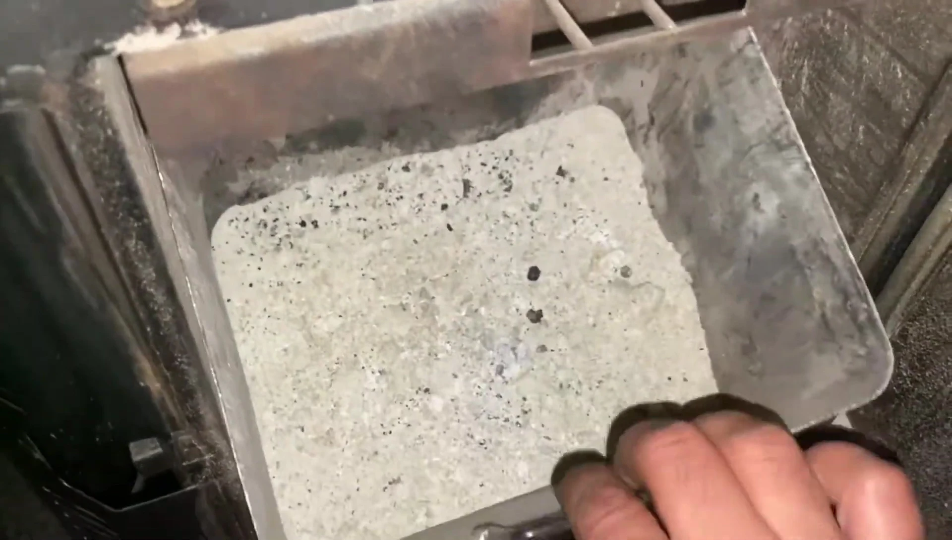 Close-up view of the minimal amount of ash produced