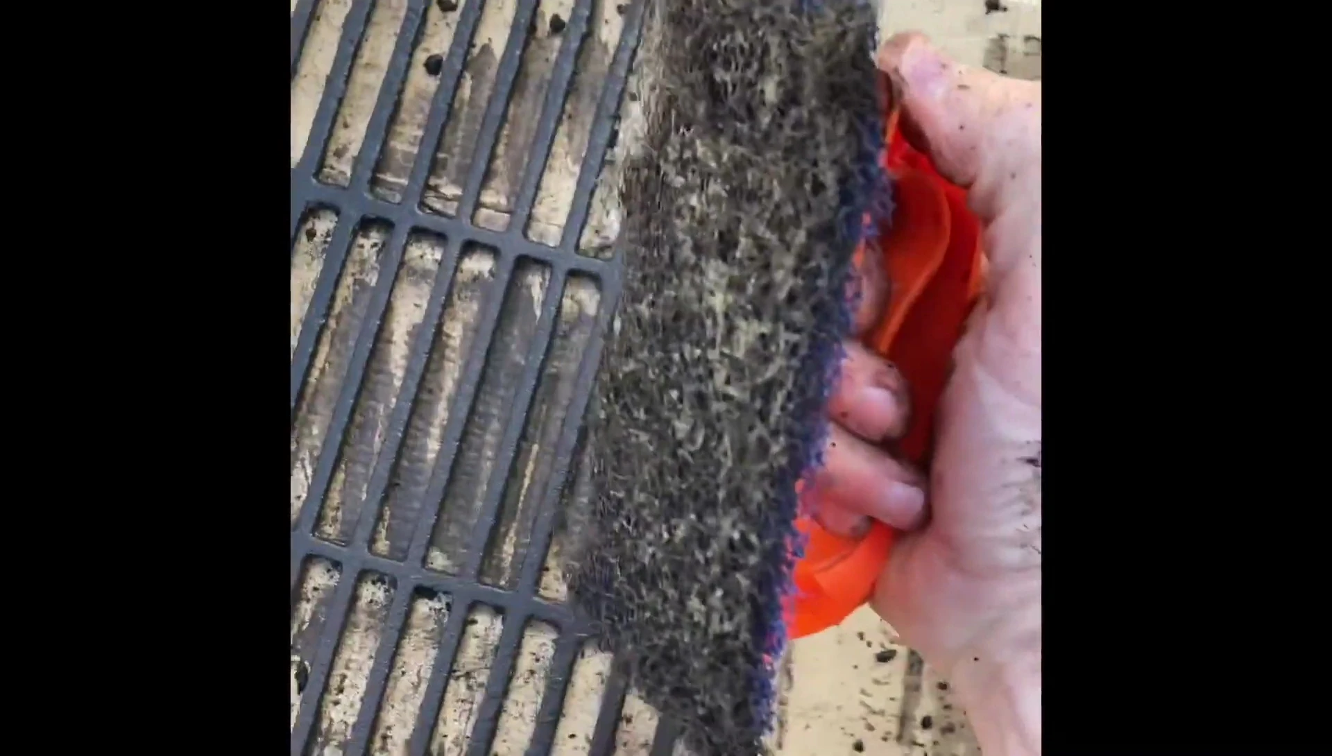 A close-up view of the cleaned grill grate, showcasing the cleanliness.