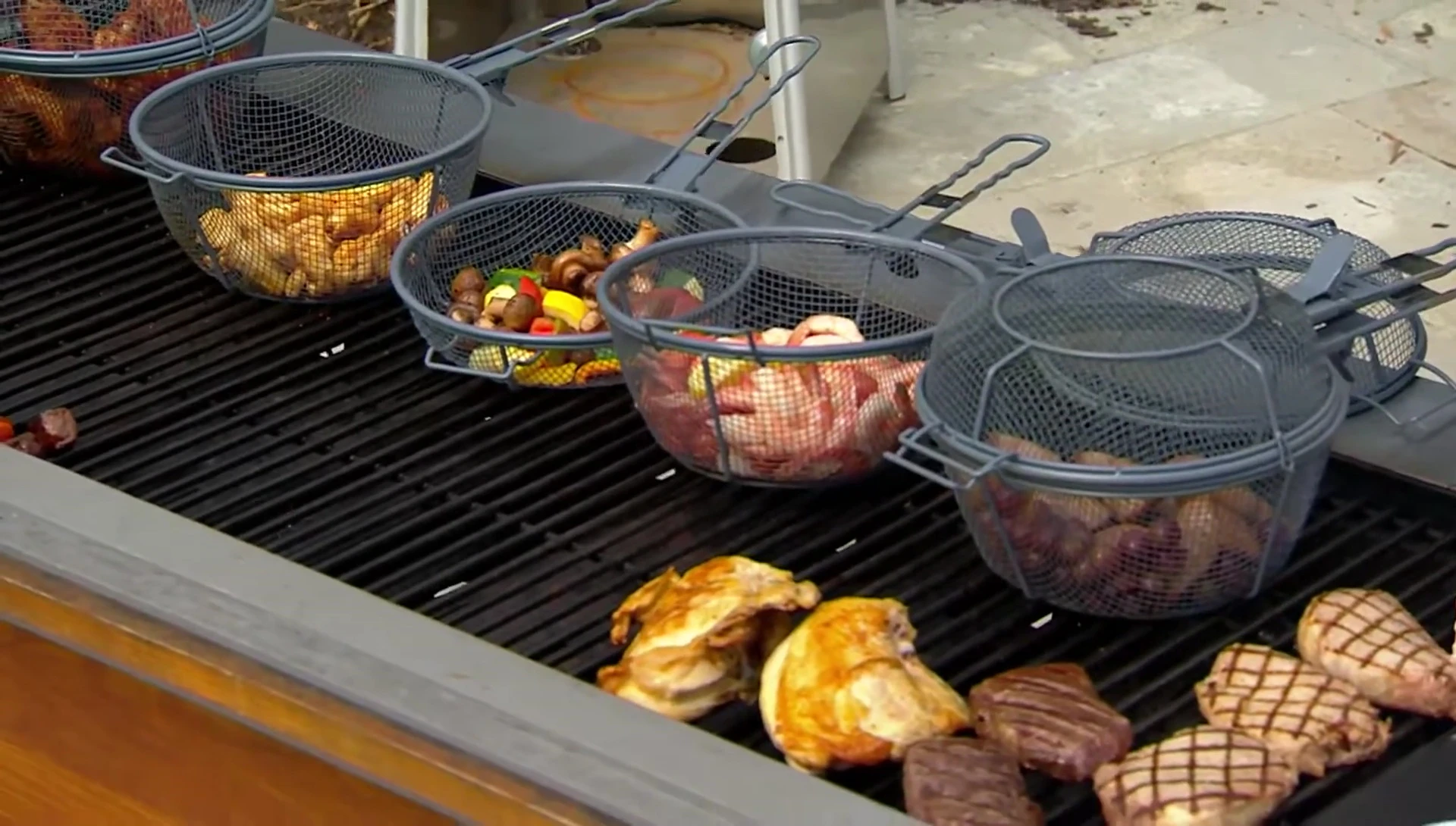 Close-up of the shallow basket of the Corky's 3-in-1 Grill Basket.