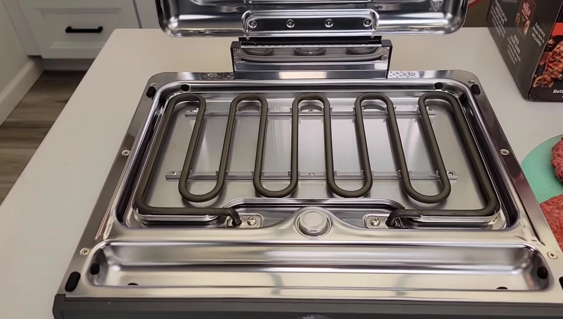 Close-up of the heating element and perforated lid