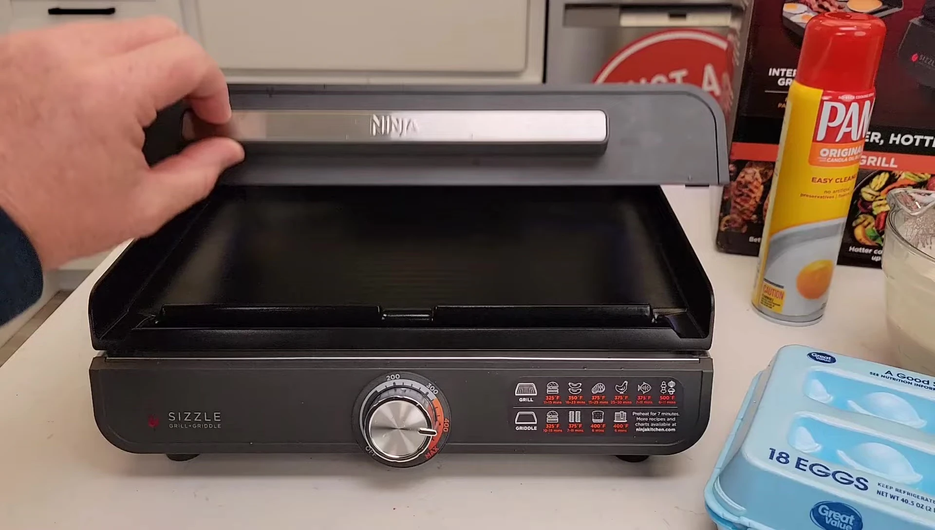 Griddle plate preheated and ready for eggs and pancakes