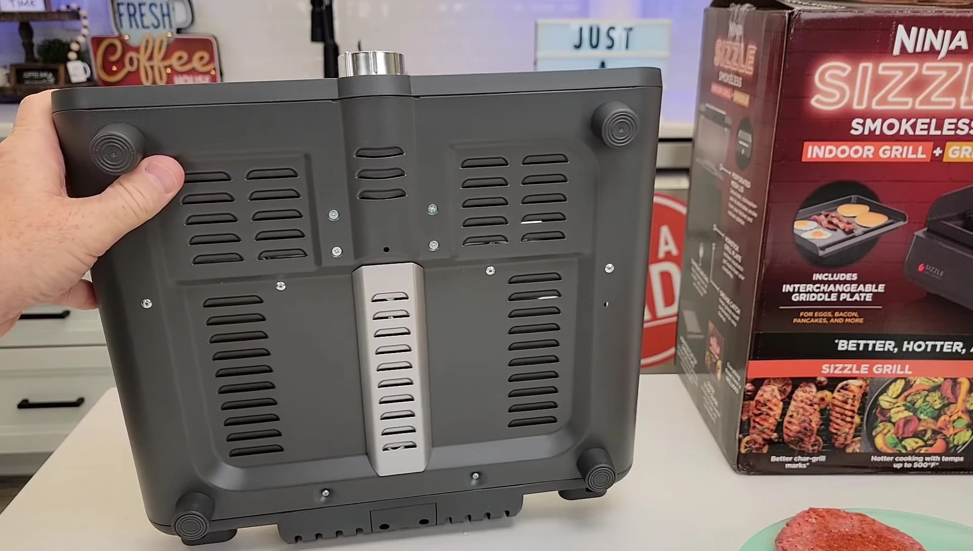 Bottom view of the unit showing the feet