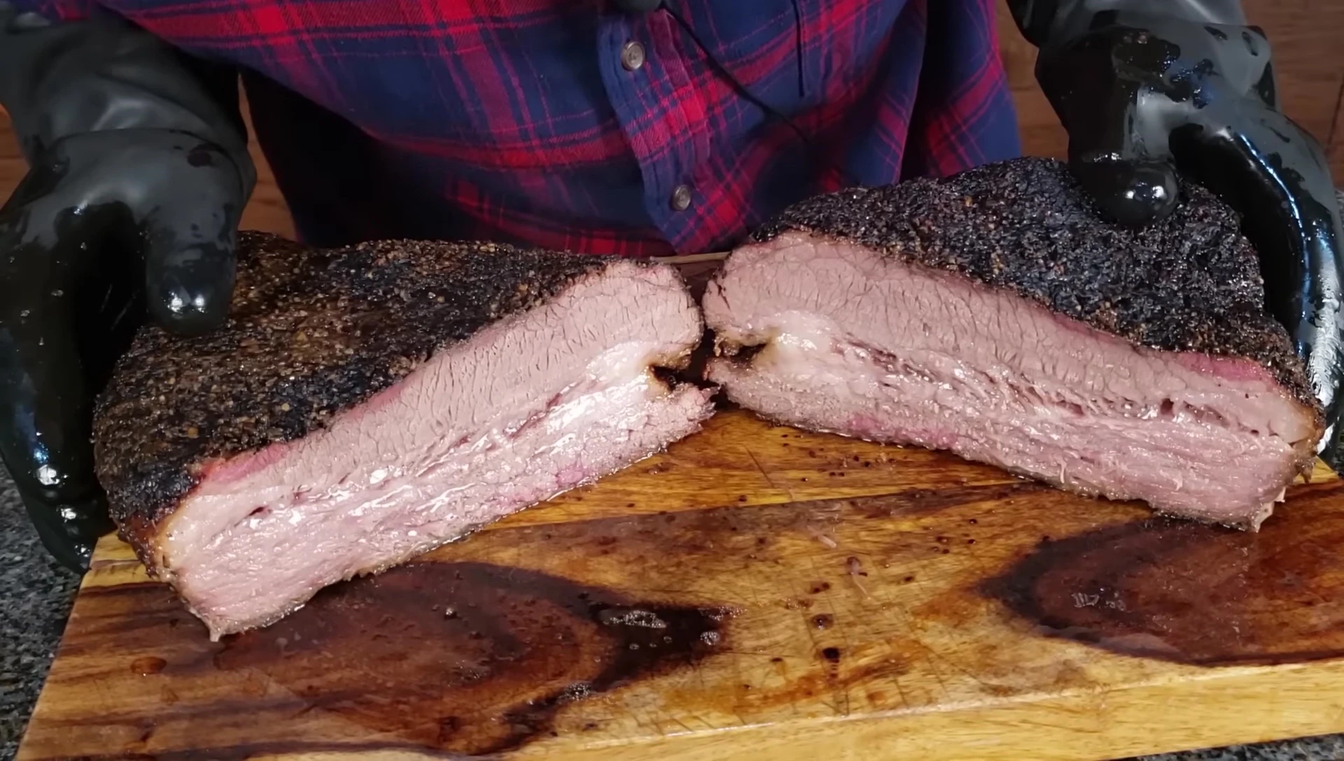 Slicing the perfectly cooked brisket.