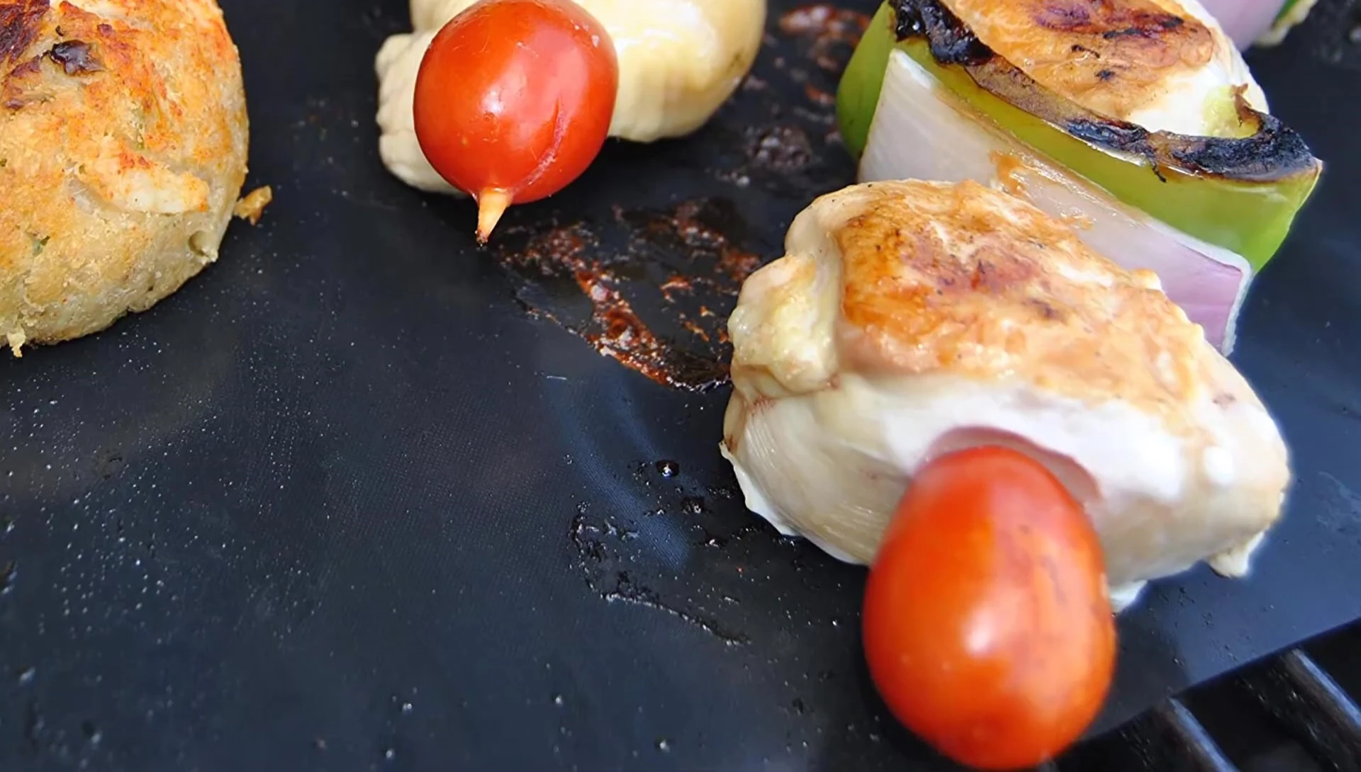 Highlighting the ease of grill cleaning with Kona mats.