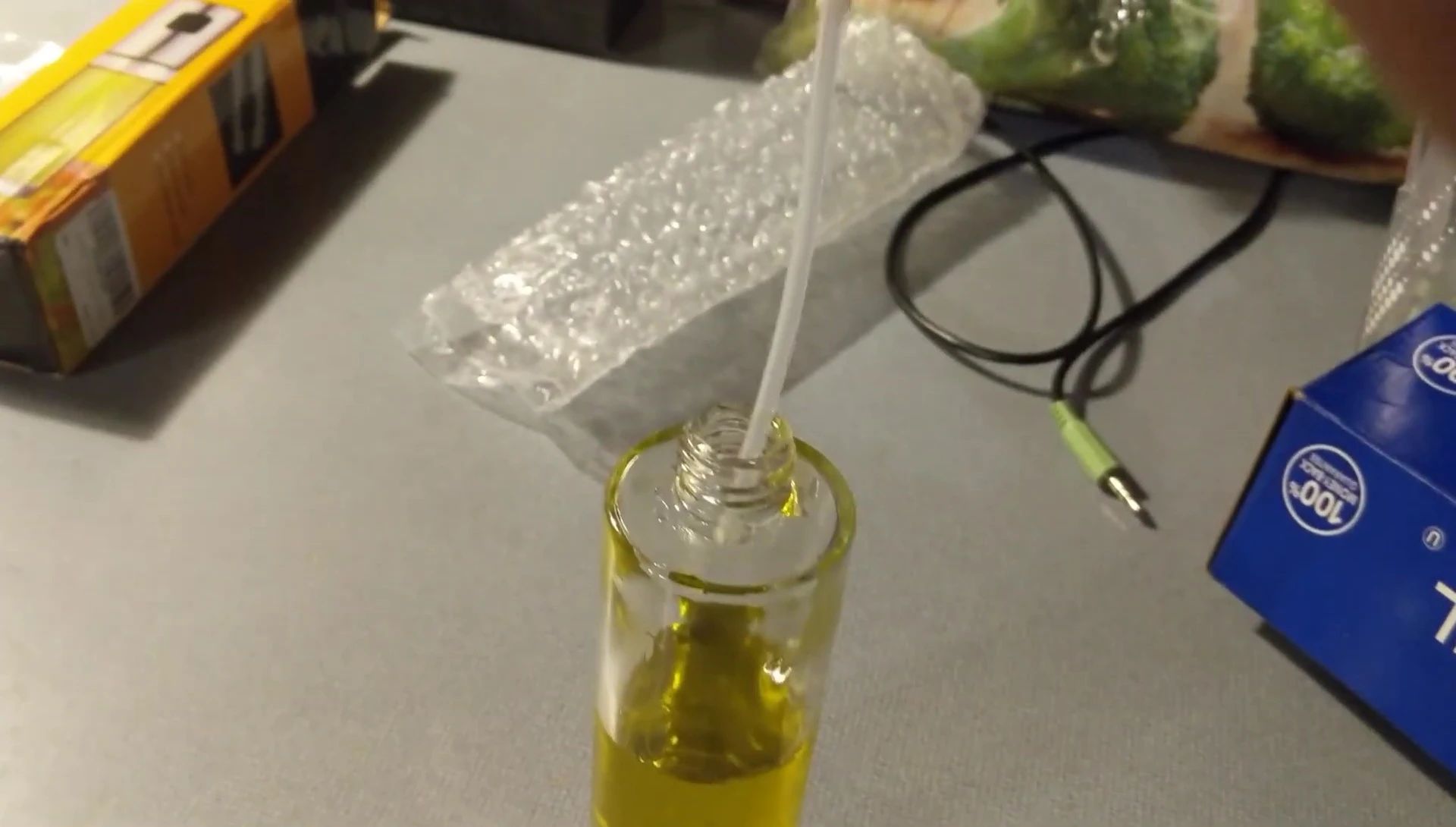 The reviewer cleaning up spilled oil.