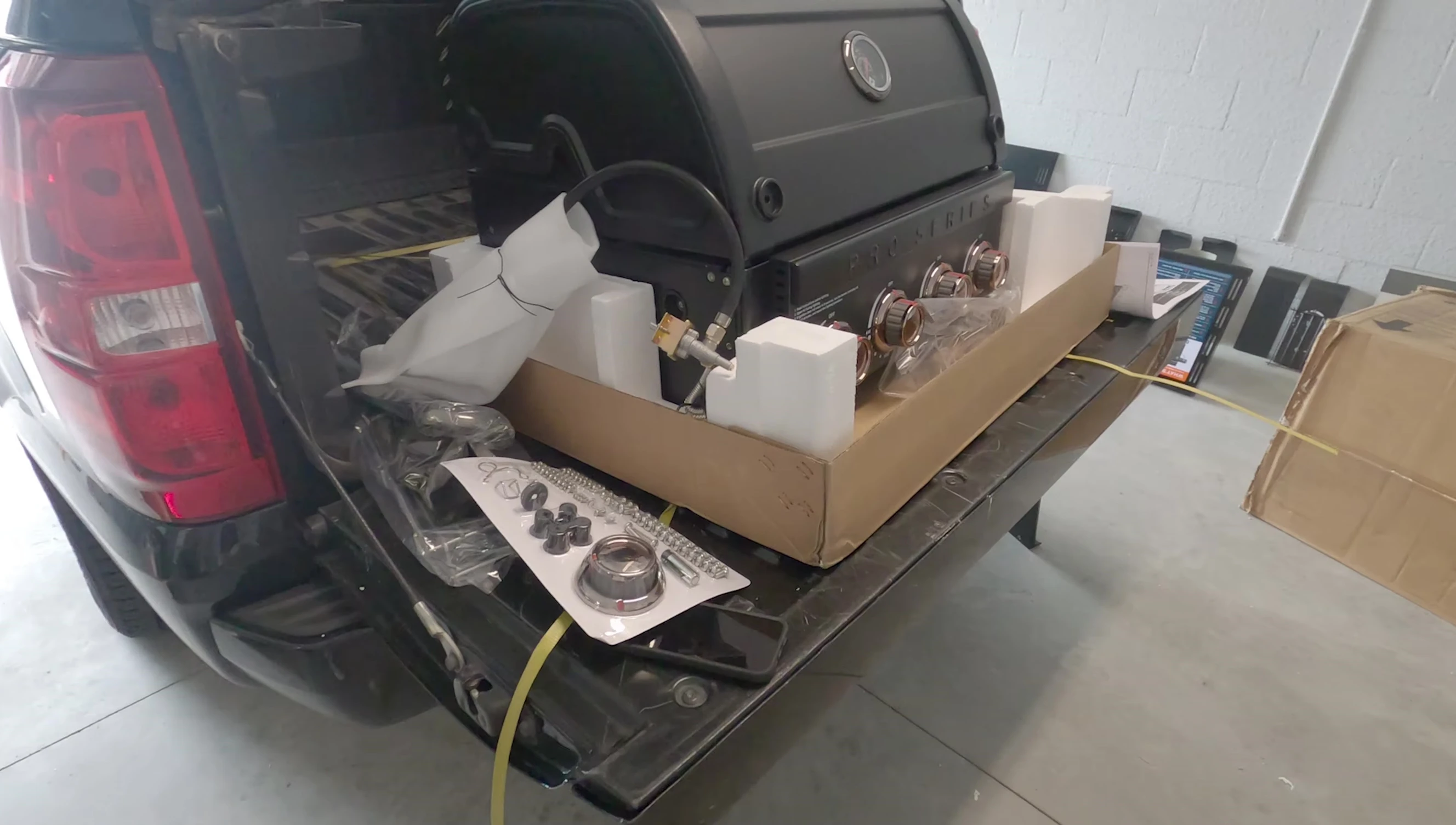 Various parts of the Member's Mark grill laid out