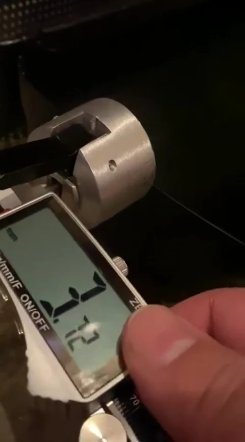 Measuring the internal diameter of the tumbler.