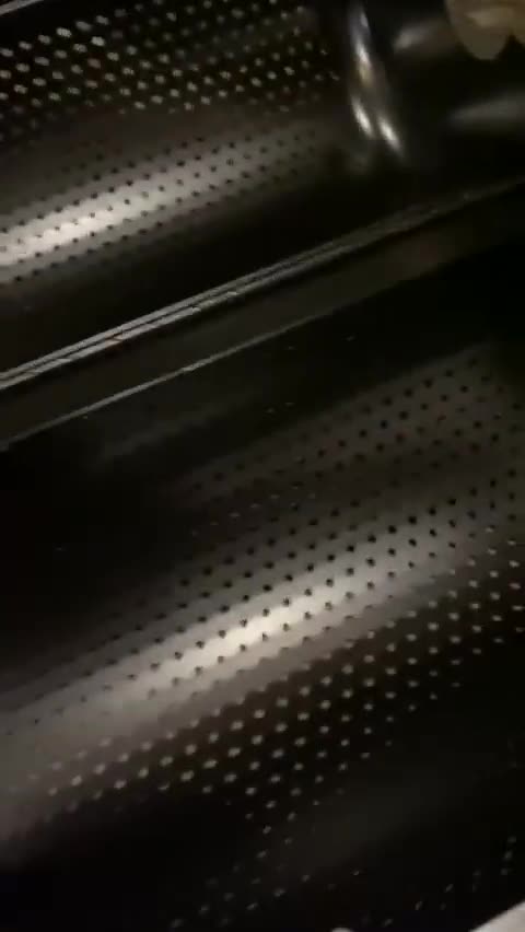 Demonstrating the flipping mechanism of the tumbler.