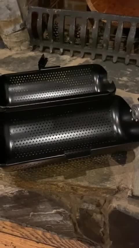 Close-up of the Everdure rotisserie tumbler.