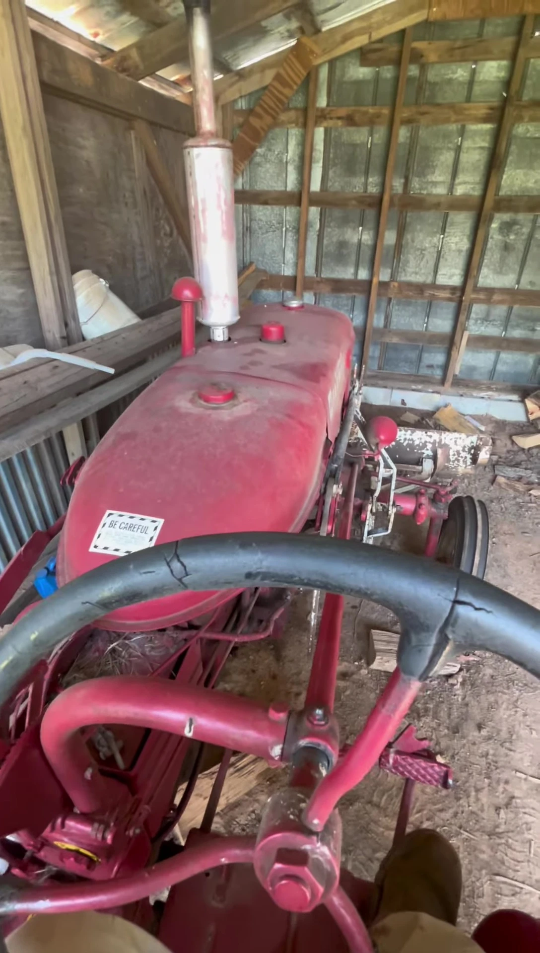 The tractor in action, spreading wood chips