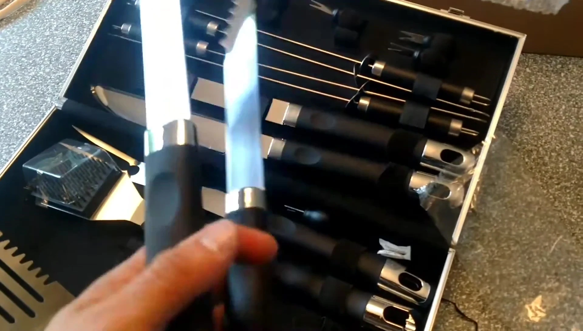 Close-up of the tongs, showcasing their rubber grips.