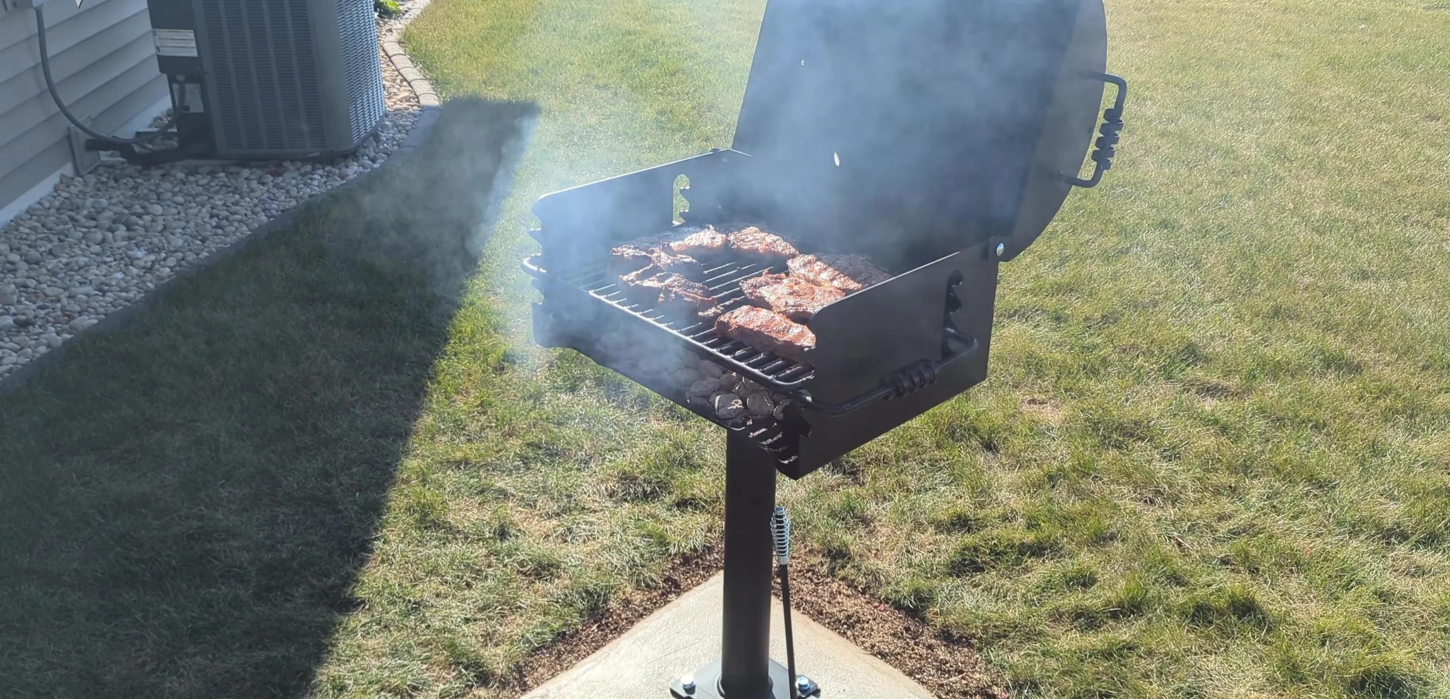 Final shot of the assembled grill with food cooking