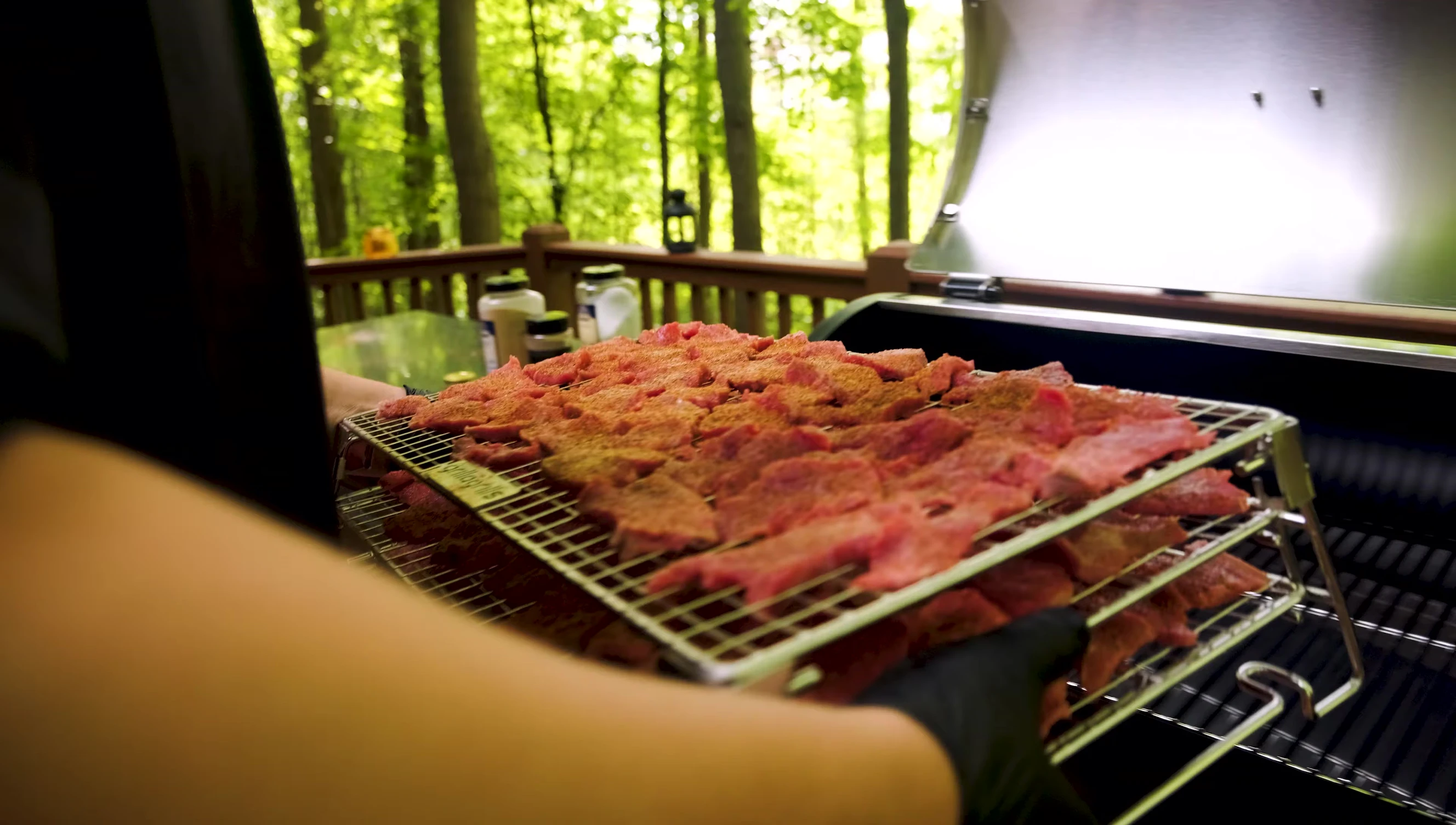 The rack loaded with a substantial amount of jerky, highlighting its capacity.