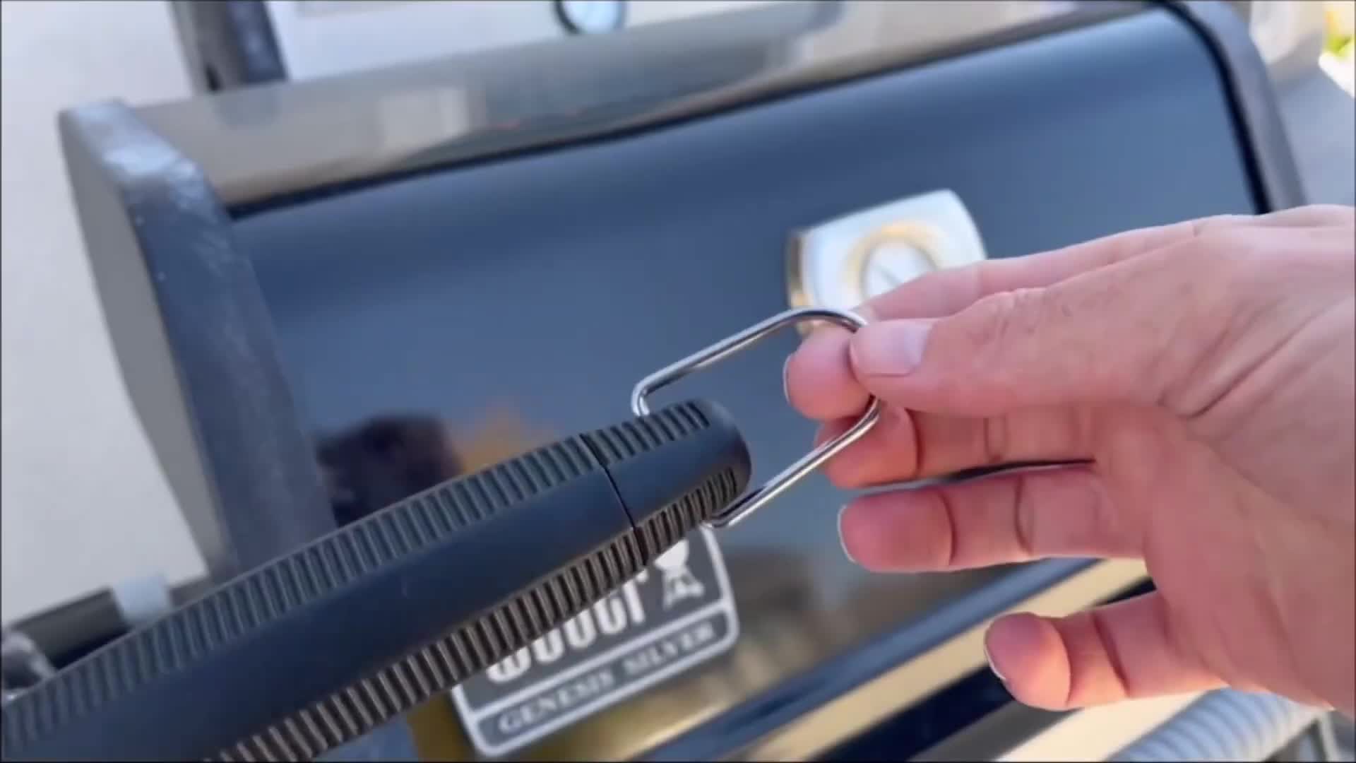 The grill brush hook shown.