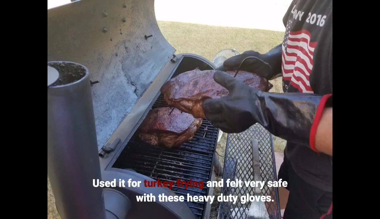 The gloves in use during turkey frying.