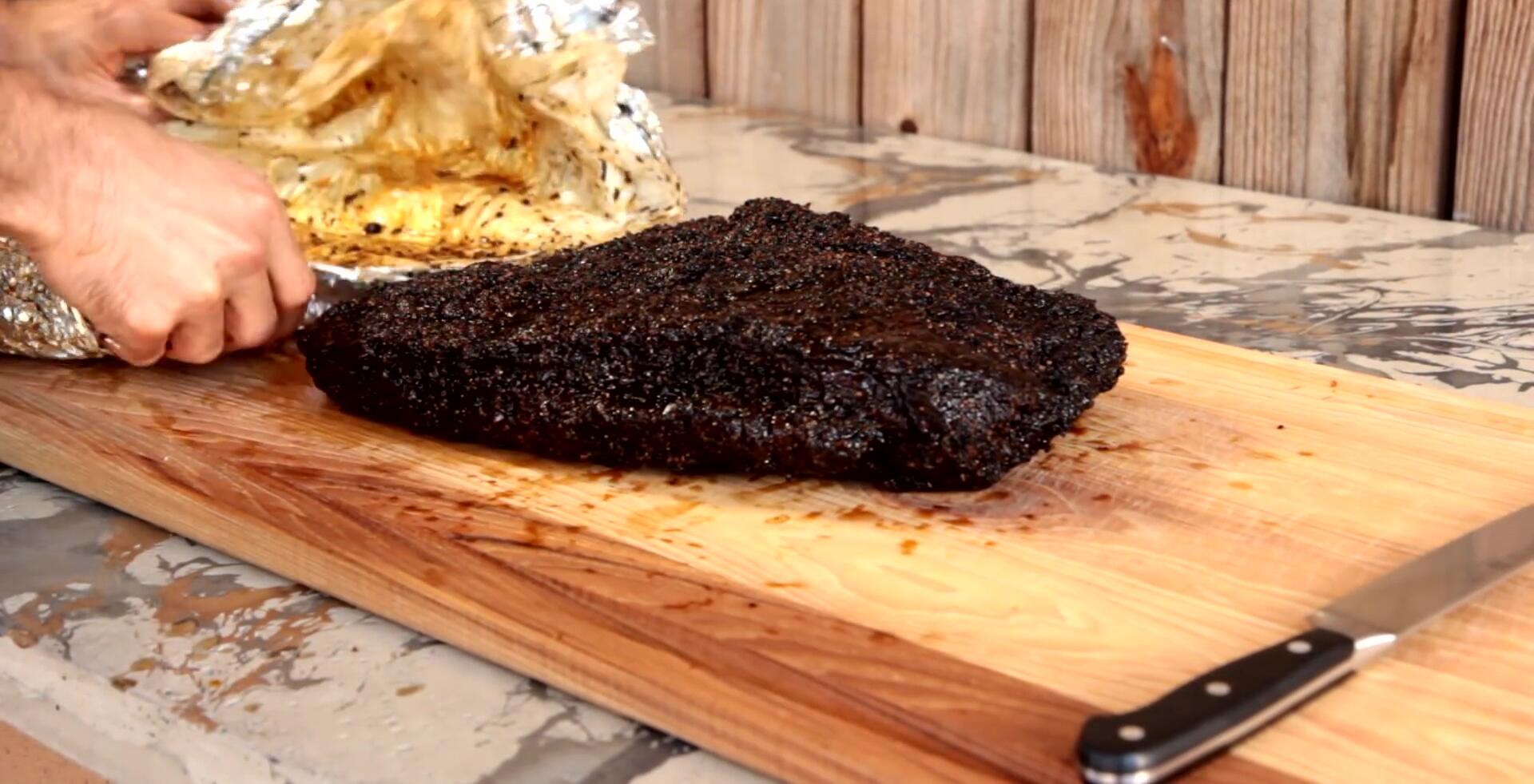 Slicing the brisket against the grain.