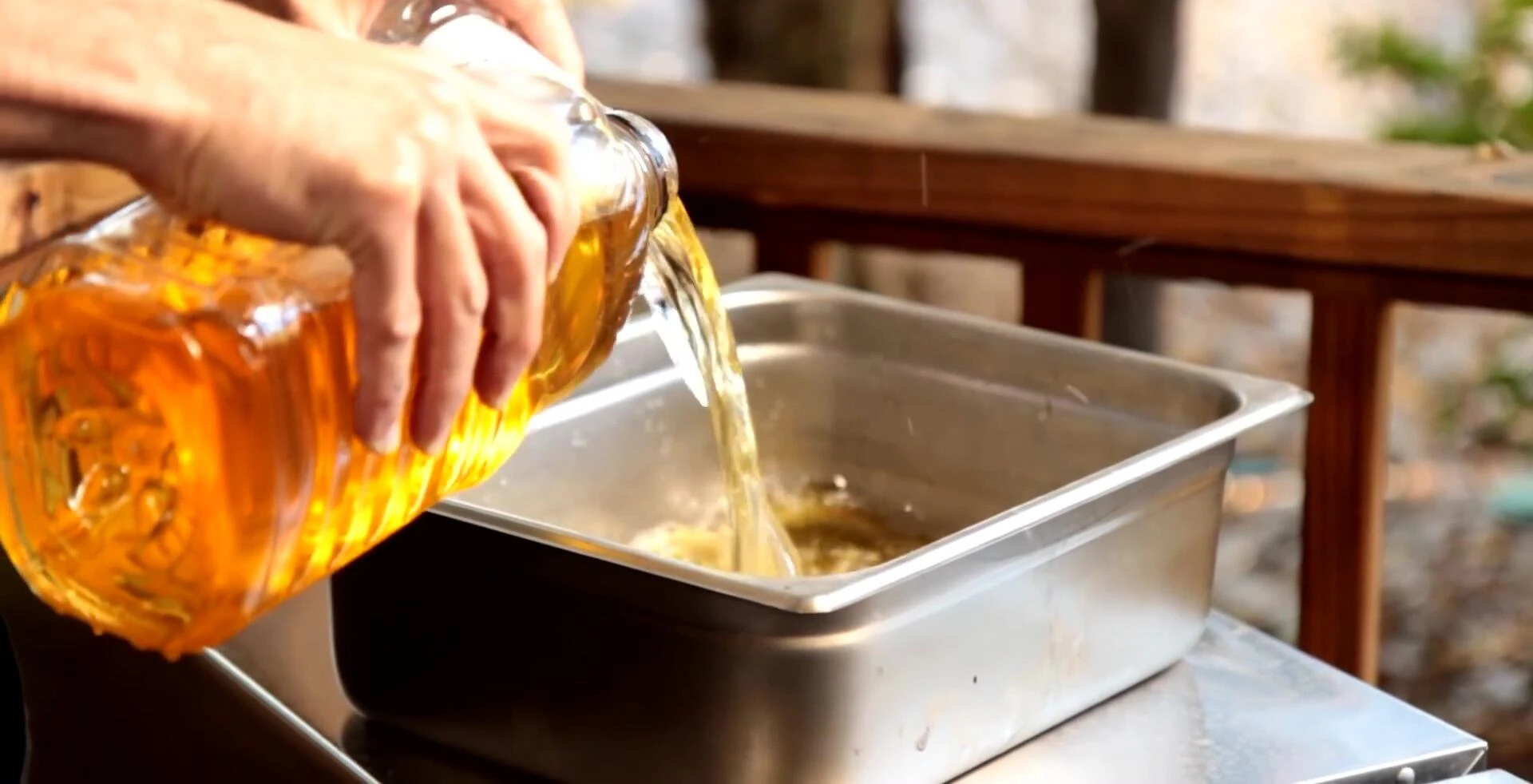 Preparing the water pan with apple juice and water.