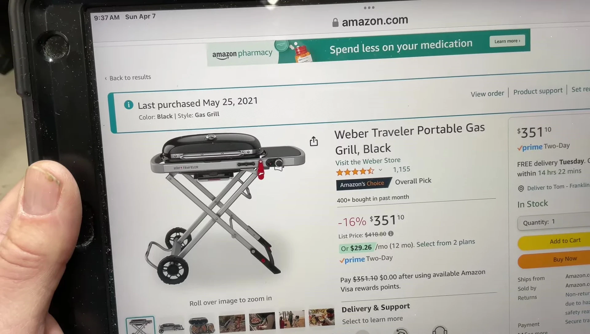 The Weber Traveler portable gas grill.
