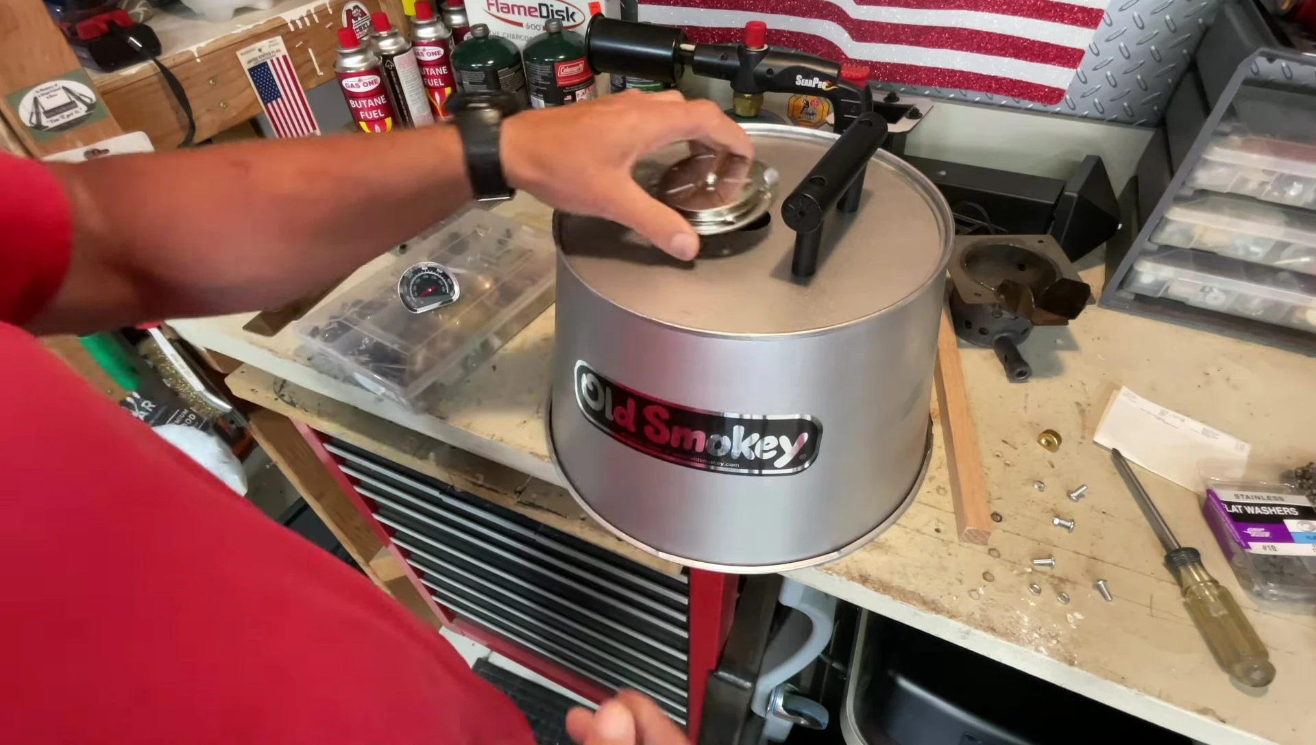 The modified Weber Smokey Joe with added daisy wheel and thermometer.