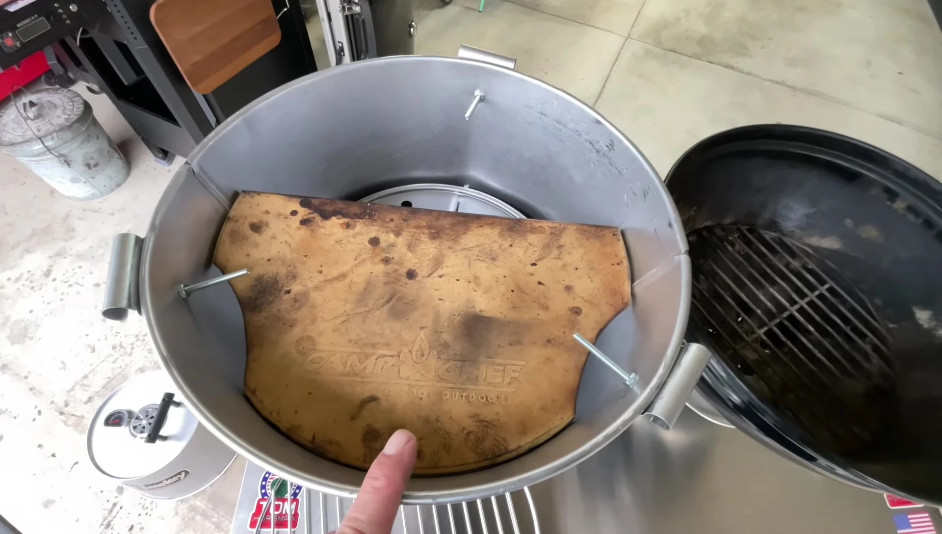 Close-up of the custom-made heat deflector for indirect cooking.
