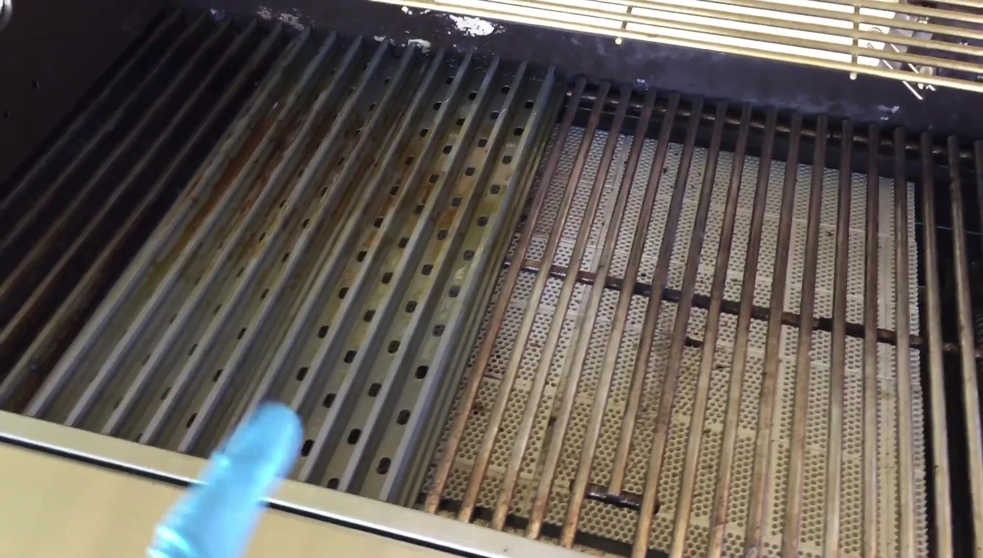 Close-up shot of the Grill Grates installed on the grill.