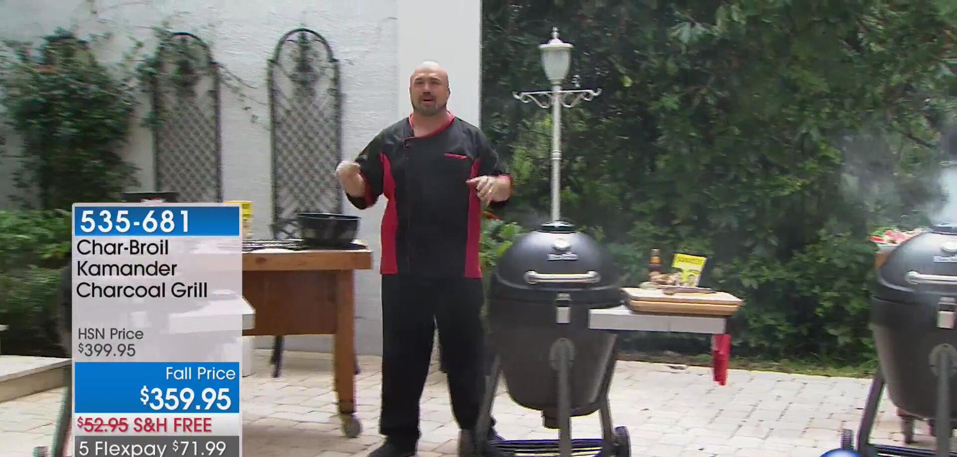 The Char-Broil Commander grill showcased next to the presenter.