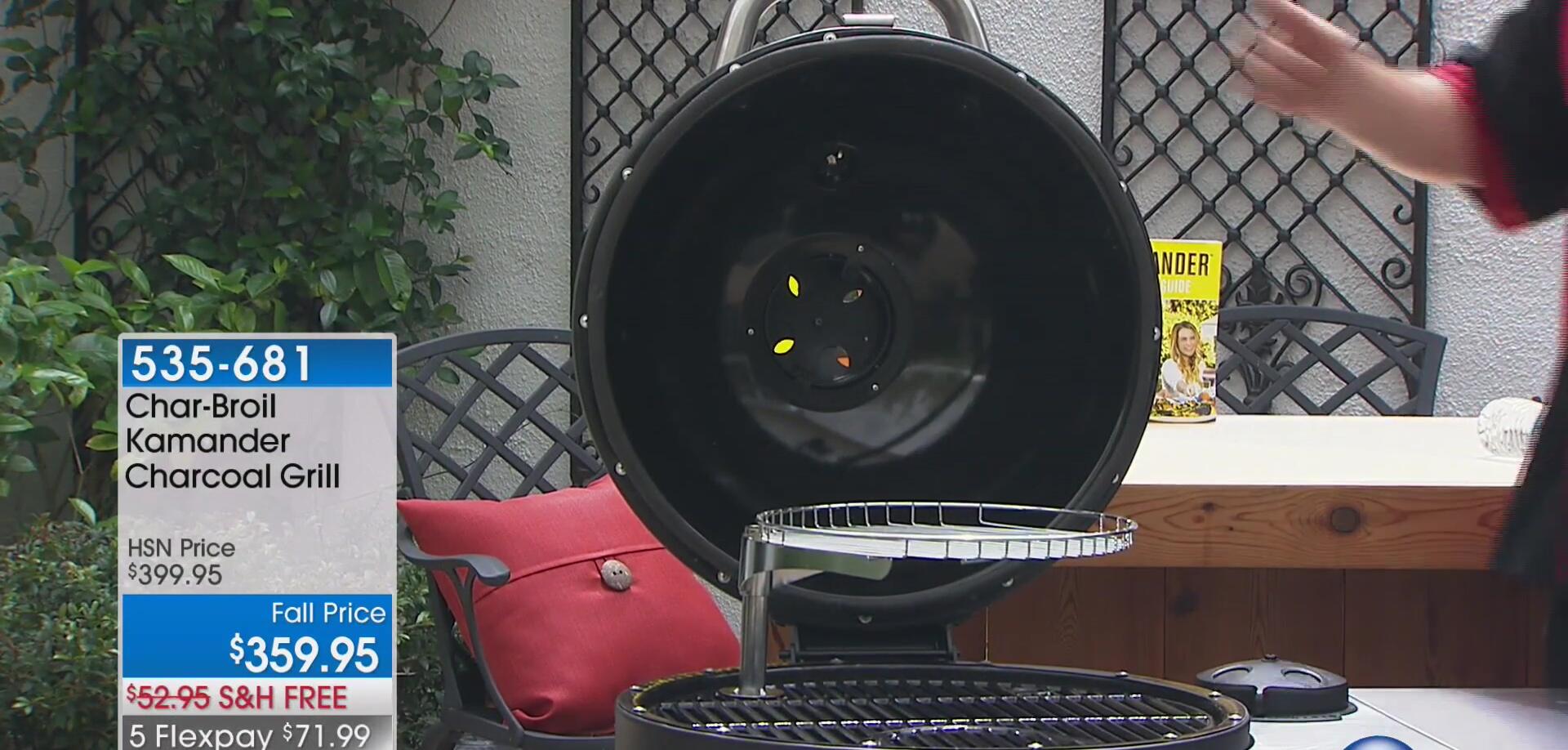 The presenter showing the ease of closing the grill lid.