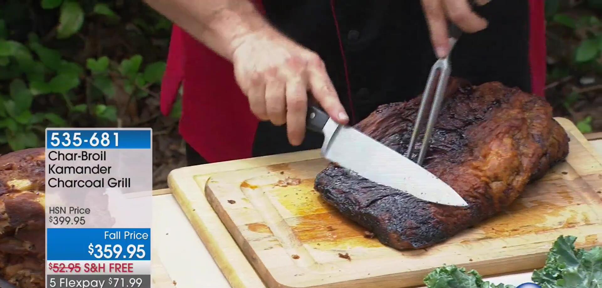 Presenter highlighting the cost-effectiveness of the Char-Broil Commander.