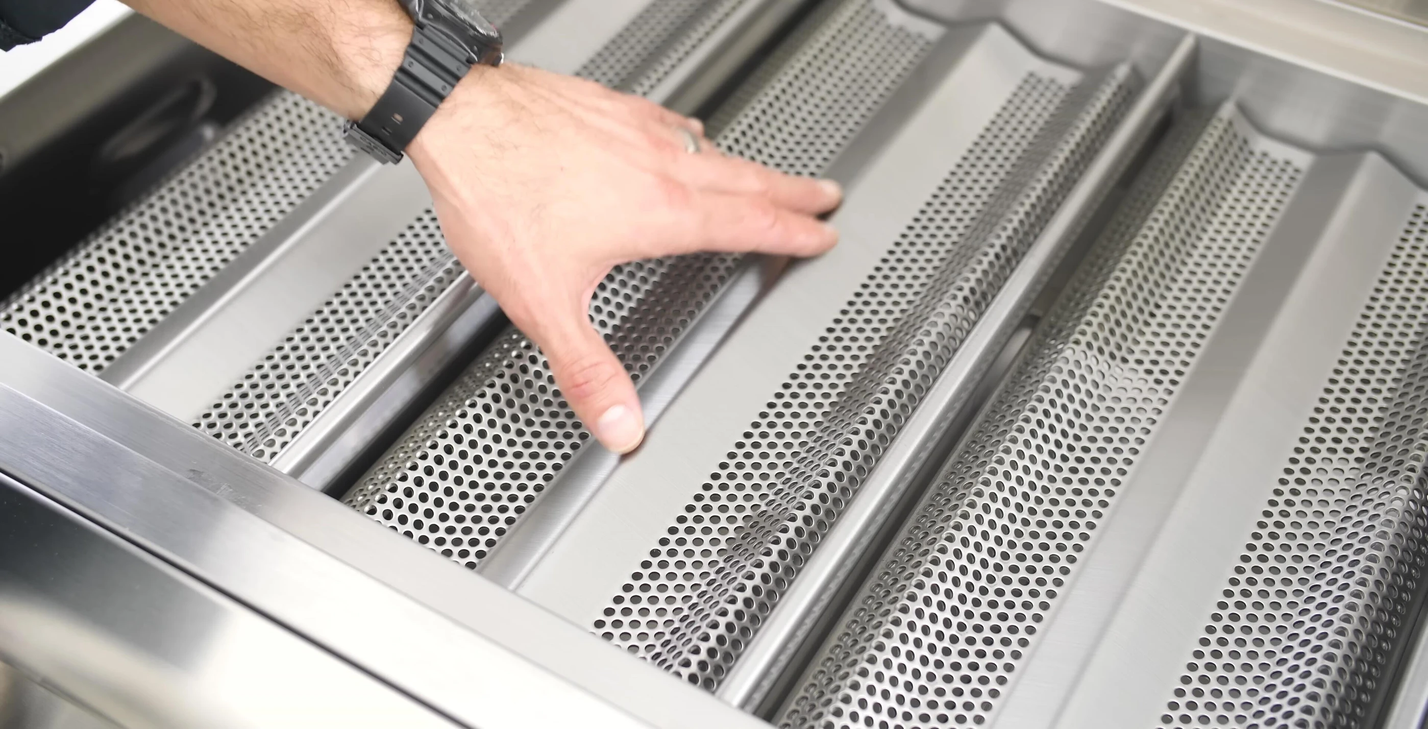 View of the flame stabilizing grids beneath the cooking surface