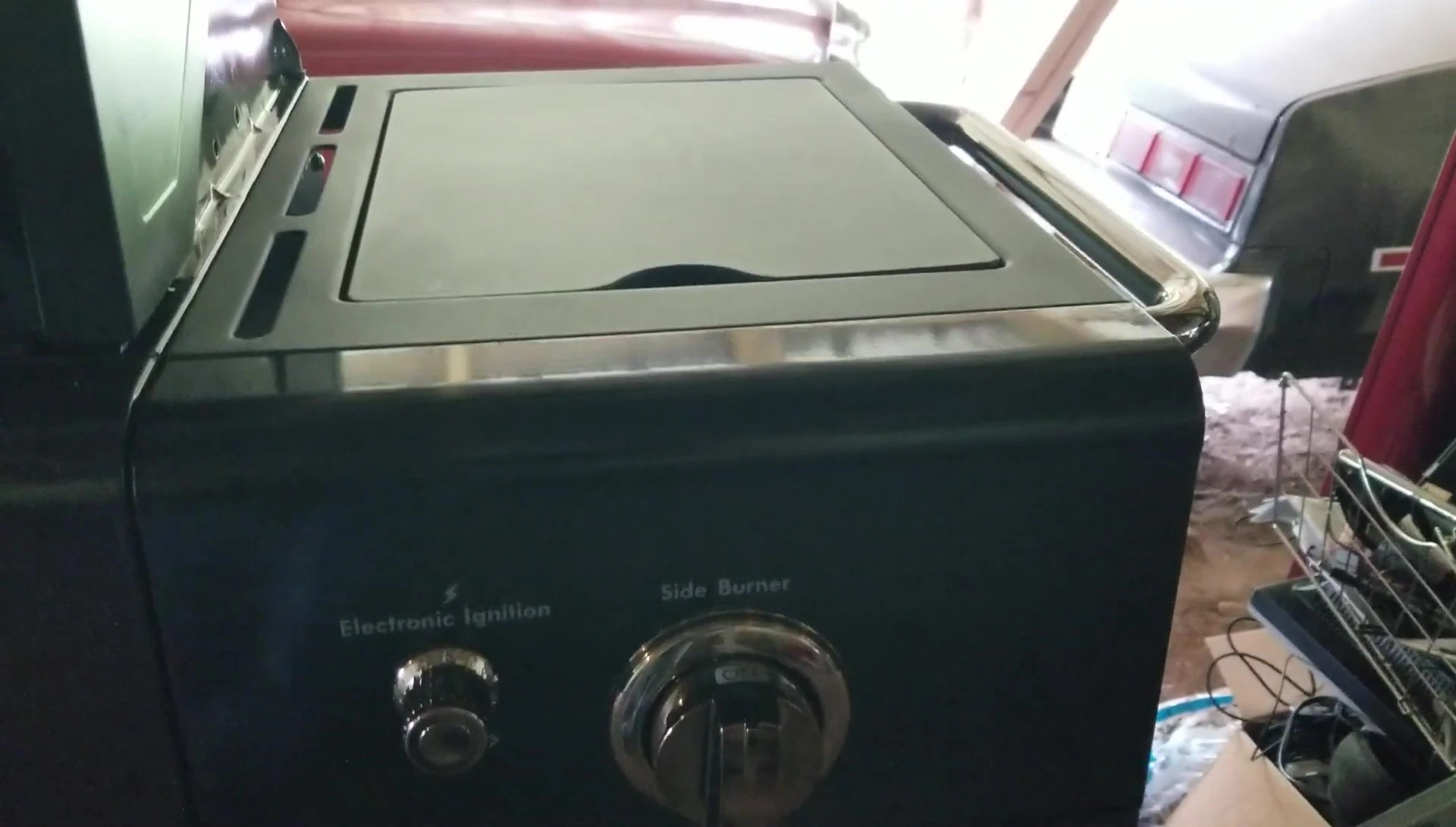 The grill's side burner in action
