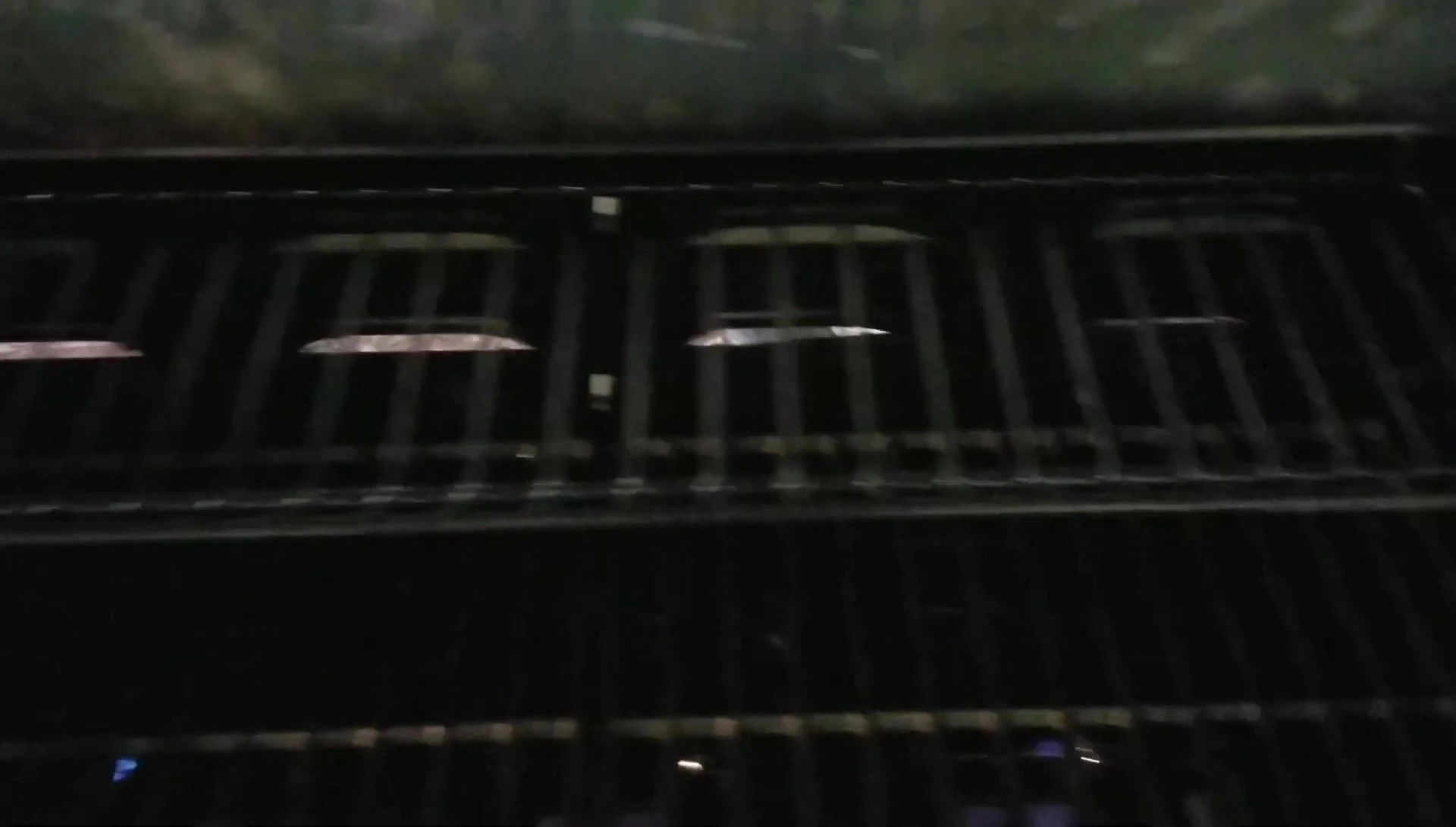 View of the upper rack designed for indirect cooking or warming