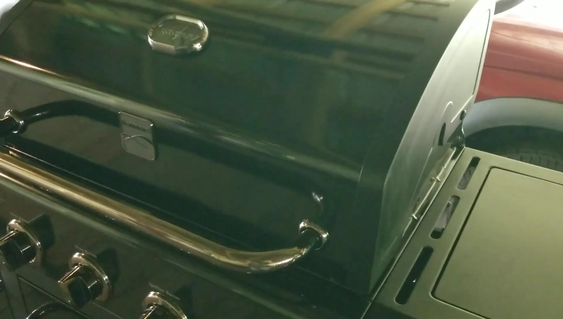 A close-up shot revealing the thin sheet metal firebox
