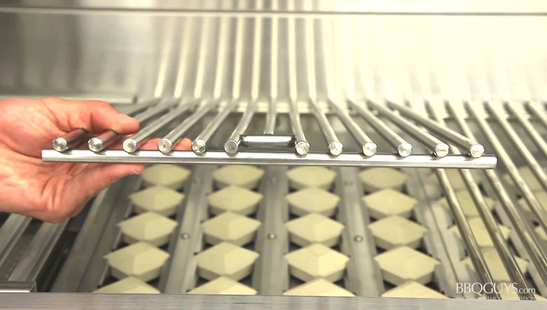 Image showcasing the solid stainless steel cooking grids
